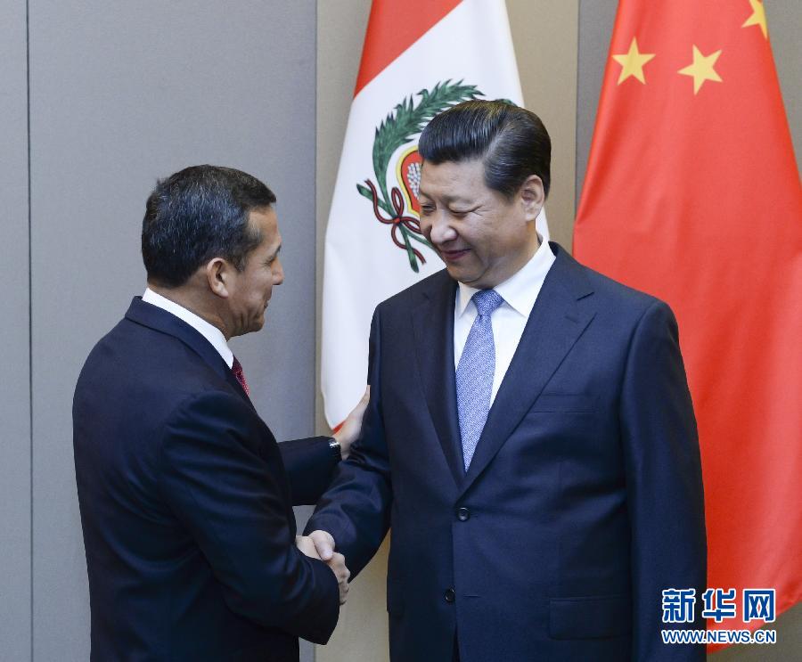 7月16日，國家主席習近平在巴西首都巴西利亞會見秘魯總統(tǒng)烏馬拉。新華社記者 劉建生 攝 