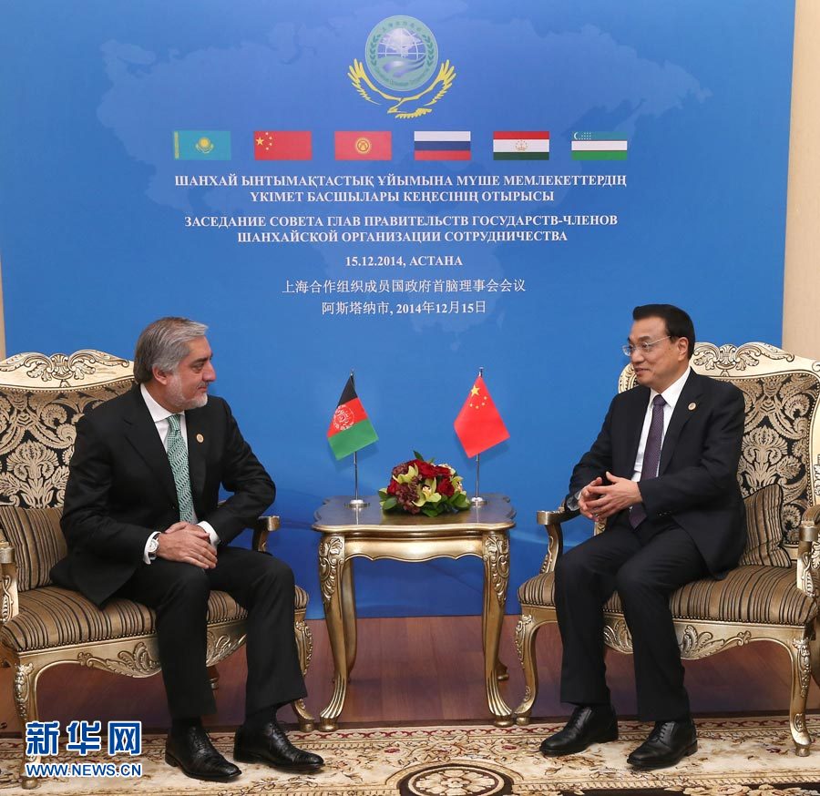 12月15日，中國國務(wù)院總理李克強(qiáng)在阿斯塔納會見阿富汗首席執(zhí)行官阿卜杜拉。 新華社記者 龐興雷 攝