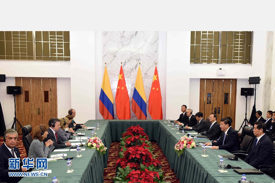 11月18日，國家主席習(xí)近平在菲律賓馬尼拉會見哥倫比亞總統(tǒng)桑托斯。 新華社記者 饒愛民 攝