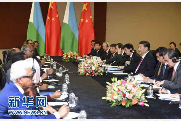 12月3日，國(guó)家主席習(xí)近平在約翰內(nèi)斯堡會(huì)見(jiàn)吉布提總統(tǒng)蓋萊。新華社記者 謝環(huán)馳 攝 

